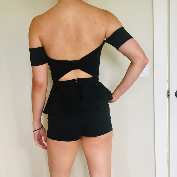 Black romper with a deep sweetheart neckline - Picture 2 of 3